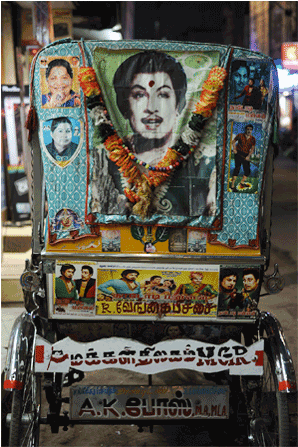 Fans Garlanding A Framed Poster Of Mgr Before The Re-release - Banner Clipart (987x446), Png Download