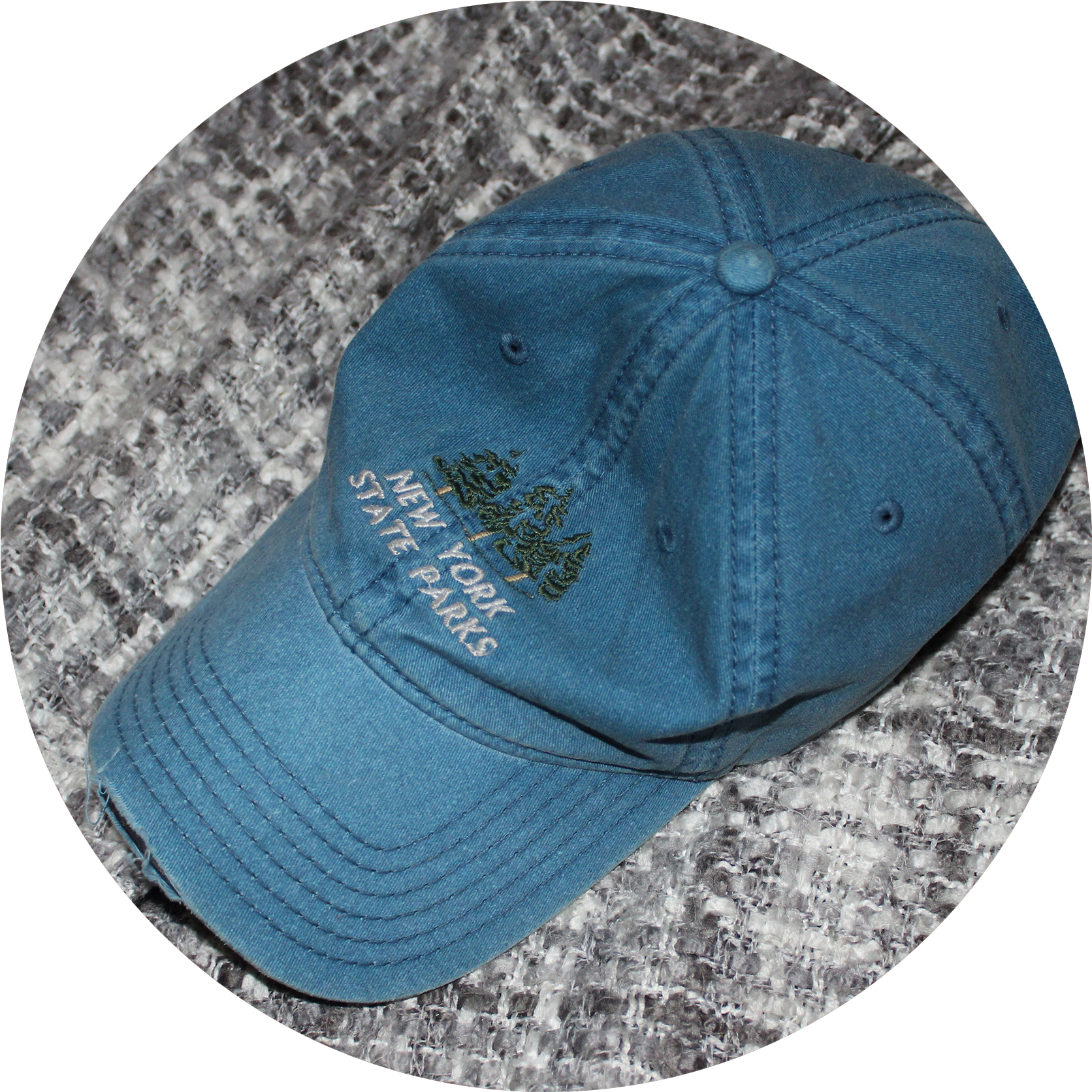 A Faded Dark Blue Jean Baseball Cap Sits On A Grey - Baseball Cap Clipart (1694x1731), Png Download