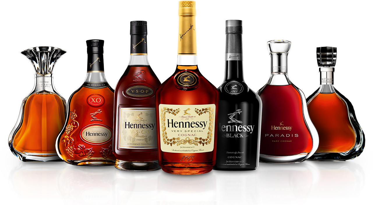 The 9 Bottles From The Hennessy Family Sitting On A Hennessy Bottle 