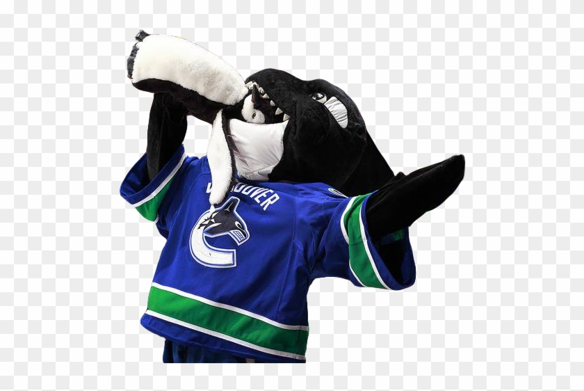Fin The Whale Devouring A Penguin Clipart