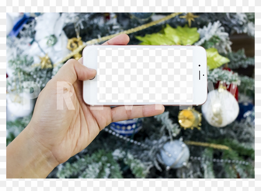 Hand Holding An Iphone, With A Christmas Tree As The - Smartphone Clipart