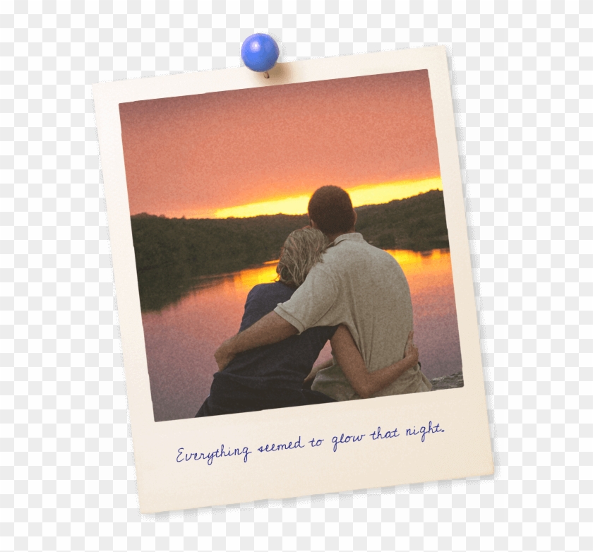 A Young Couple Leans In For A Kiss With An Orange Sunset - Picture Frame Clipart