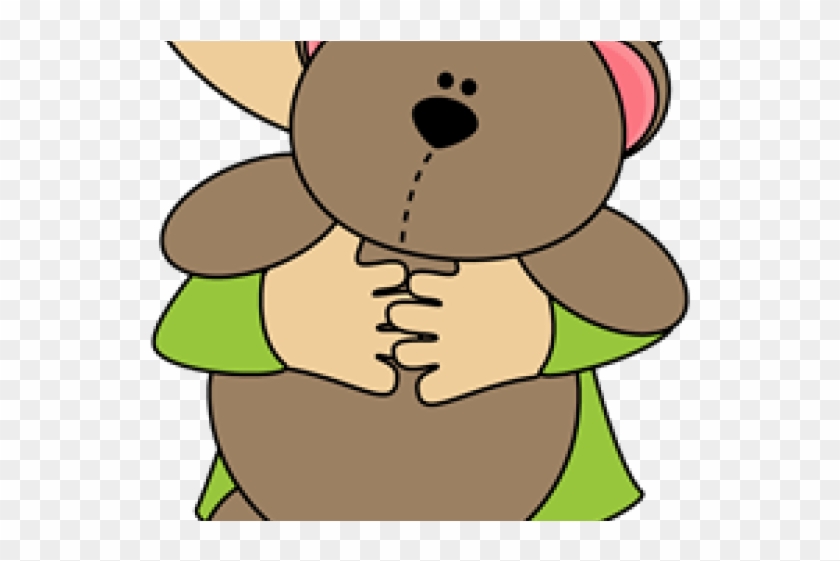 hugging stuffed animal