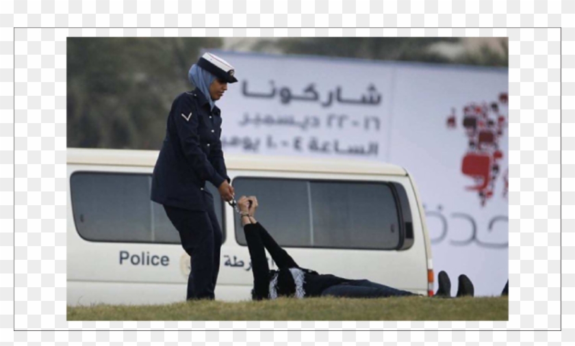 A Police Officer Drags Zainab Al-khawaja After Handcuffing - Zainab Al Khawaja Clipart